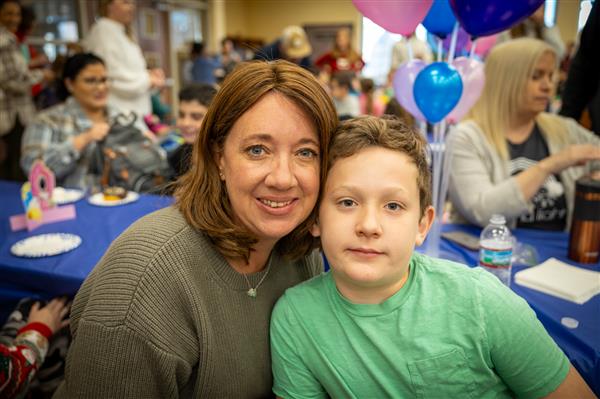 mom and son smiling